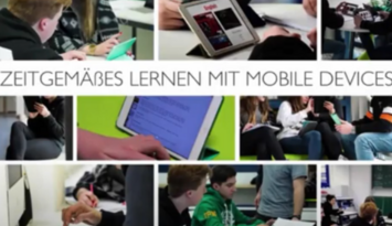 Bild zeigt Schülerinnen und Schüler die mit IPADs arbeiten